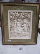 A framed medieval scene romantic plaque.