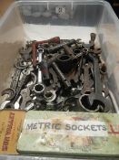 A box of various spanners and sockets.