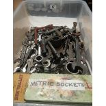 A box of various spanners and sockets.