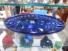 A large blue glass bowl.