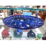 A large blue glass bowl.