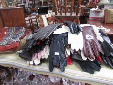 A large quantity of ladies gloves and scarves,