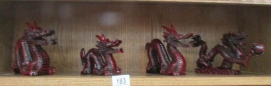 4 Dragon figures,.