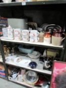 3 shelves of assorted kitchenware including Pyrex.