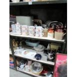 3 shelves of assorted kitchenware including Pyrex.