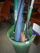 A green bin containing tools.