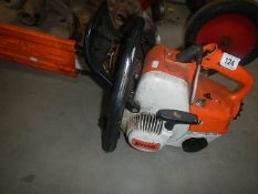 A petrol chain saw,