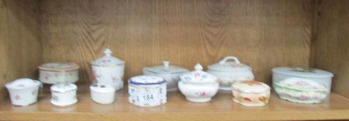 A shelf of assorted trinket boxes including Royal Crown Derby, Limoges, Palissy etc.