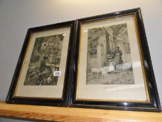 2 black and white framed and glazed prints.