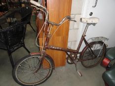 A vintage Raleigh Twenty bicycle.