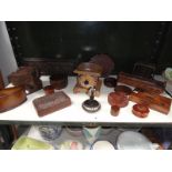 A collection of carved wooden items, including incense burner, trinket pots, trays etc.