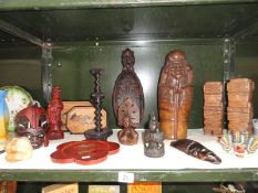 An assortment of 15 wooden ornamental items including figures, trays, masks etc.