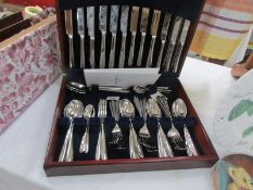 A Royal Doulton canteen of cutlery.