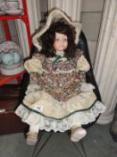 A large vintage style porcelain collectors' doll.