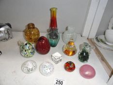 13 glass ornaments including paperweights.