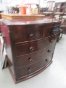 A 2 over 3 mahogany bow front chest of drawers, a/f.