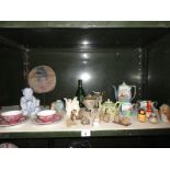 A collection of oriental themed items including figures, teaware etc.