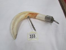 A horn cork screw / bottle opener.