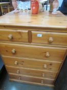A Pine 2 over 3 chest of drawers.