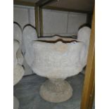 A decorative two handled urn.