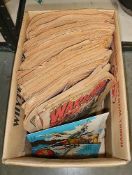 A box of Warlord comics