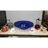 A blue art glass bowl and candle holders