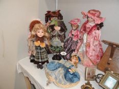 A quantity of porcelain collectors' dolls.