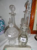 2 glass decanters and 2 other items.