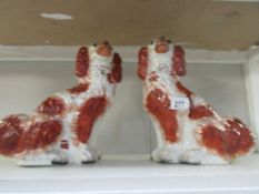 A pair of Staffordshire spaniels.