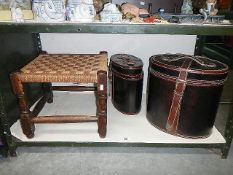 2 storage boxes and a wooden woven topped stool