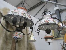 A pair of ceramic ceiling lights.