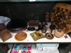 An assortment of wooden ware including chess board, trinket pots, upholstered foot stool etc.