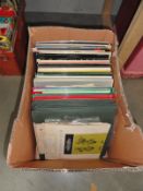 A box of LP records including classical music.