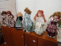 6 porcelain collectors' dolls.