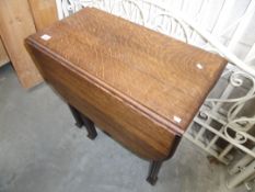 A drop leaf gateleg table.