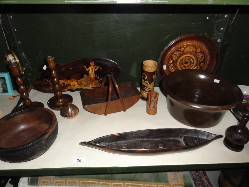 An assortment of 12 wooden ornamental items including trays, candlesticks, bowls etc.