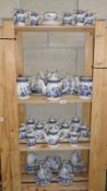 4 shelves of churchill blue willow pattern tea ware etc.