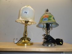 A Tiffany style lamp and 1 other.