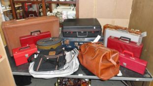 A quantity of suitcases etc.