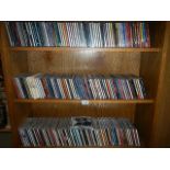 3 shelves of assorted CDs including swing, big band, musical, pop, folk, country, classical etc.