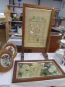 A fire screen for 1937 coronation, a painted mirror and 2 dried flower pictures.