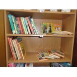 2 shelves of childrens books including Enid Blyton.