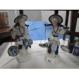 A pair of Chinese fisher men figures,