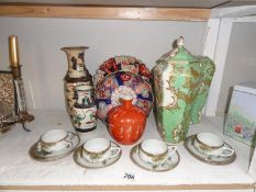 17 pieces of assorted oriental ceramics including cups and saucers, vases, plates etc.