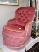 A pink plush bedroom chair.