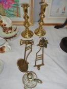 A pair of victorian candlesticks and piano candle sconces with back plates etc.