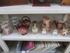 A shelf of assorted china.