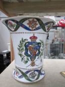 A vase with armorial decoration and crossed swords mark.