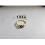 A 9ct gold 3 stone ring, size U.