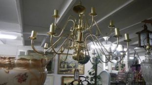 A large brass ceiling light.